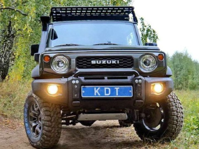 Передний композитный бампер для Suzuki Jimny (c 2019 г., под покраску)
